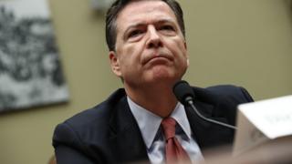 James Comey - at a microphone