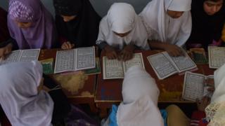 Orphaned children study the Koran at the Edhi Foundation in the port city of Karachi. February 15, 2016