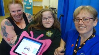 Tia with mother Elaine Saddington and community children’s nurse Ann Marie Boland