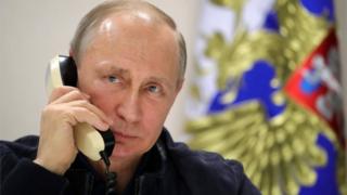 путін