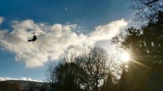 Person on a zip wire