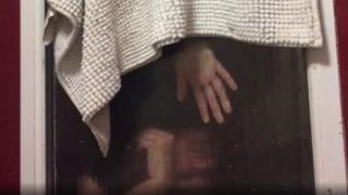 Woman wey trap inside the window