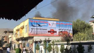 Smoke billows from scene of a gun battle between Afghan security forces and militants in Shar-e-Naw area of Kabul, Afghanistan, 6 September 2016