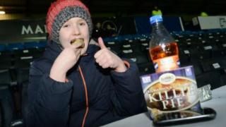 Young fan eats Killie Pie