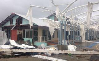 A marina near Airlie Beach in Queensland was badly damaged