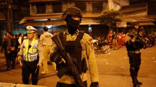 Police at the site of the explosion