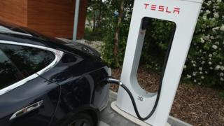 Tesla car at a charging station
