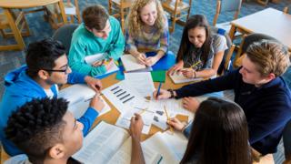 Group of teenagers in a library