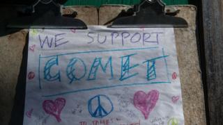 A sign is seen at the Comet Ping Pong restaurant in Washingon, DC, on December 5, 2016.