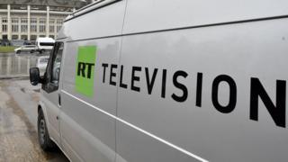 A Russia Today (RT) television broadcast van is seen parked in Moscow