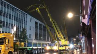 Primark crane being removed