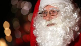 Volunteer Student Santas Prepare For Christmas Season
