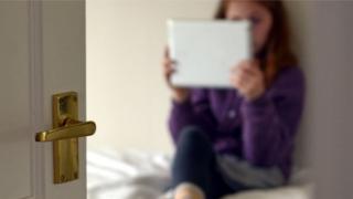 Child looking at a tablet computer