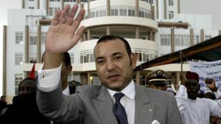 King Mohammed VI of Morocco greets the crowd