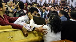 Mourners gather for funerals for victims of a bomb explosion at Mar Girgis Coptic church in Tanta, Egypt 10 April 2017