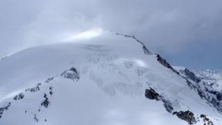 Police said the skiers were stuck outside overnight in the Pigne d'Arolla area