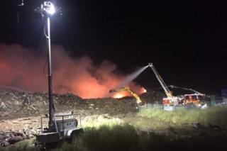 Fire crews work to extinguish a blaze at a recycling factory in Melbourne