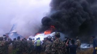 Wreckage of the plane at Kathmandu airport, Nepal, 12 March 2018