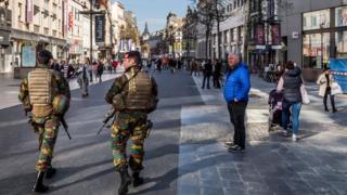 Police patrol De Meir street in Antwerp on 23 March 2017