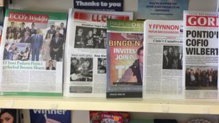 Papurau bro for sale in a Caernarfon newsagents