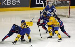 The athletes of Team Korea in action during the Women's Ice Hockey friendly match against Sweden