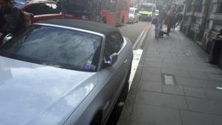 Car with parking ticket