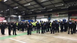 Police briefing before raids