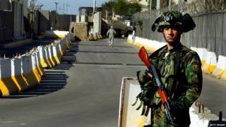 Iraqi soldier guards the Green Zone (file photo)