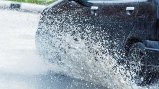 Car in rain water