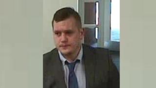 CCTV image of man in bank