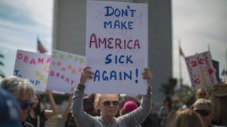 Demonstrators protest Donald Trump's policies that threaten the Affordable Care Act, Medicare and Medicaid, in Los Angeles, California, 25 January 2017