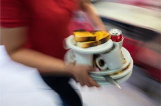 Carrying dirty dishes