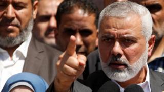هنية أعلن نبأ القبض على المشتبه به في مؤتمر صحفي
