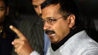 Delhi Chief Minister Arvind Kejriwal gestures as he addresses the media in New Delhi on December 15, 2015.