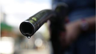 Fuel nozzle at filling station