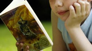 Child reading a book