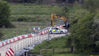 Police car at Sharnbook site