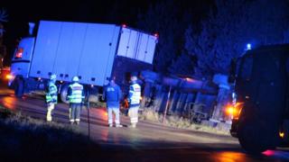 Lorry sheds meatball load near Skara in Sweden, November 2017