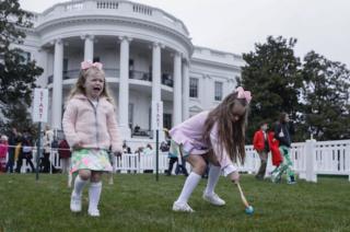 Victoria Ewers and her sister Elle Ewers participate in the 2018 White House Easter Egg Roll.