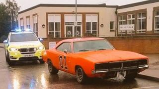 Car with police car