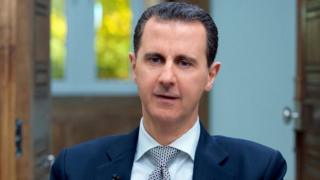 アサド大統領は、シリアは化学兵器を廃棄したと主張した(12日、ダマスカス)