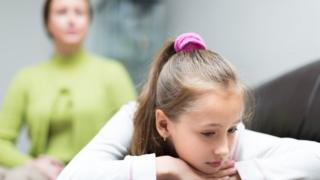 Parent talking to a child