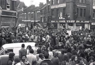 A crowd of anti-fascist protesters gather