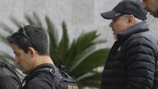 Police arresting former Brazilian Finance Minister