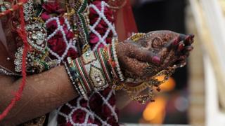 A Hindu Jain bride in a mass wedding ceremony at the Karnawati Club in Ahmedabad on February 2, 2014
