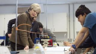 Theresa May in a school
