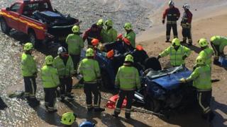 A car on Porth beach