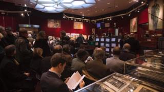 People attend an auction at Hotel Drouot in Paris (filed picture)