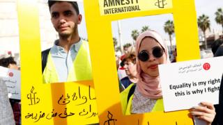 Protesters shout slogans during a march, demanding equal inheritance rights for women, in Tunis, Tunisia March 10, 2018.