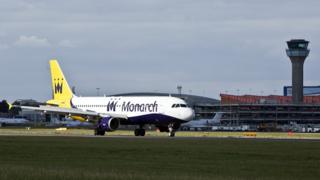 Monarch plane on ground